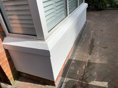 Sand and cement render application