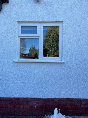 Weatherproof external wall render